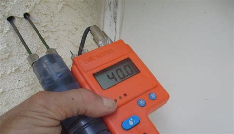 how to check for moisture behind stucco|stucco moisture testing.